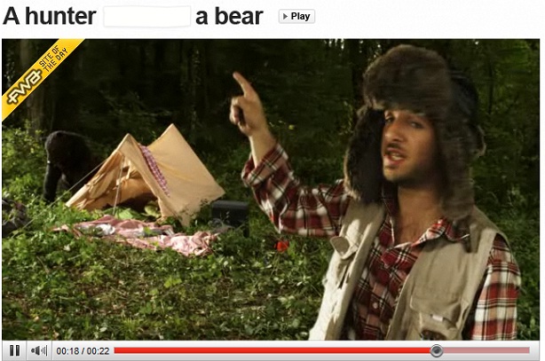 a hunter shoots a bear